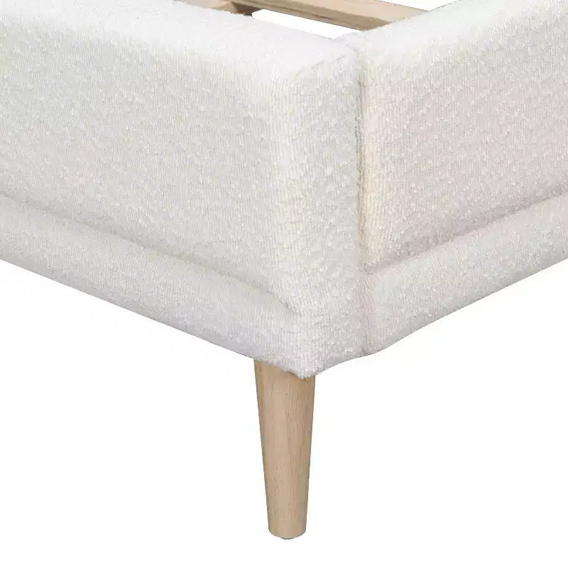 Letto imbottito Hollis in bouclé con testiera ad ali, bianco